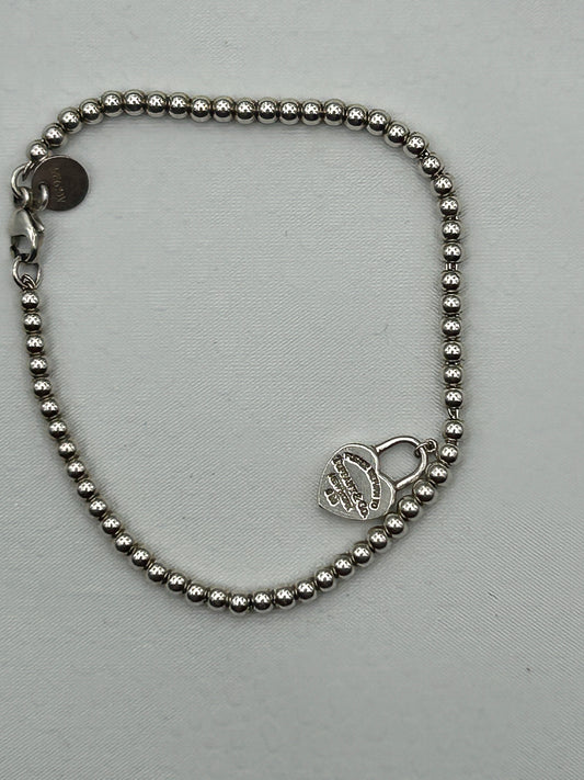 Tiffany & Co
Return to Tiffany silver bracelet