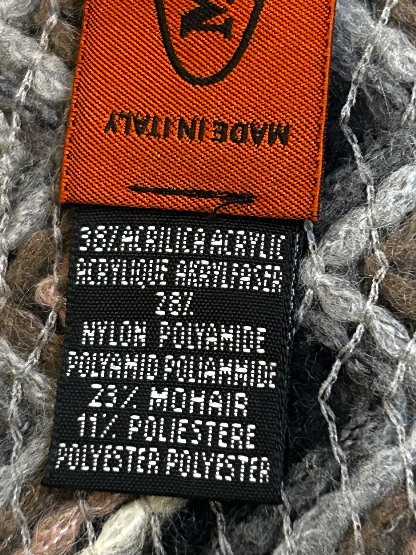 Missoni Zigzag Fringed Scarf, designed in Italy with the brand's iconic chevron knit pattern.