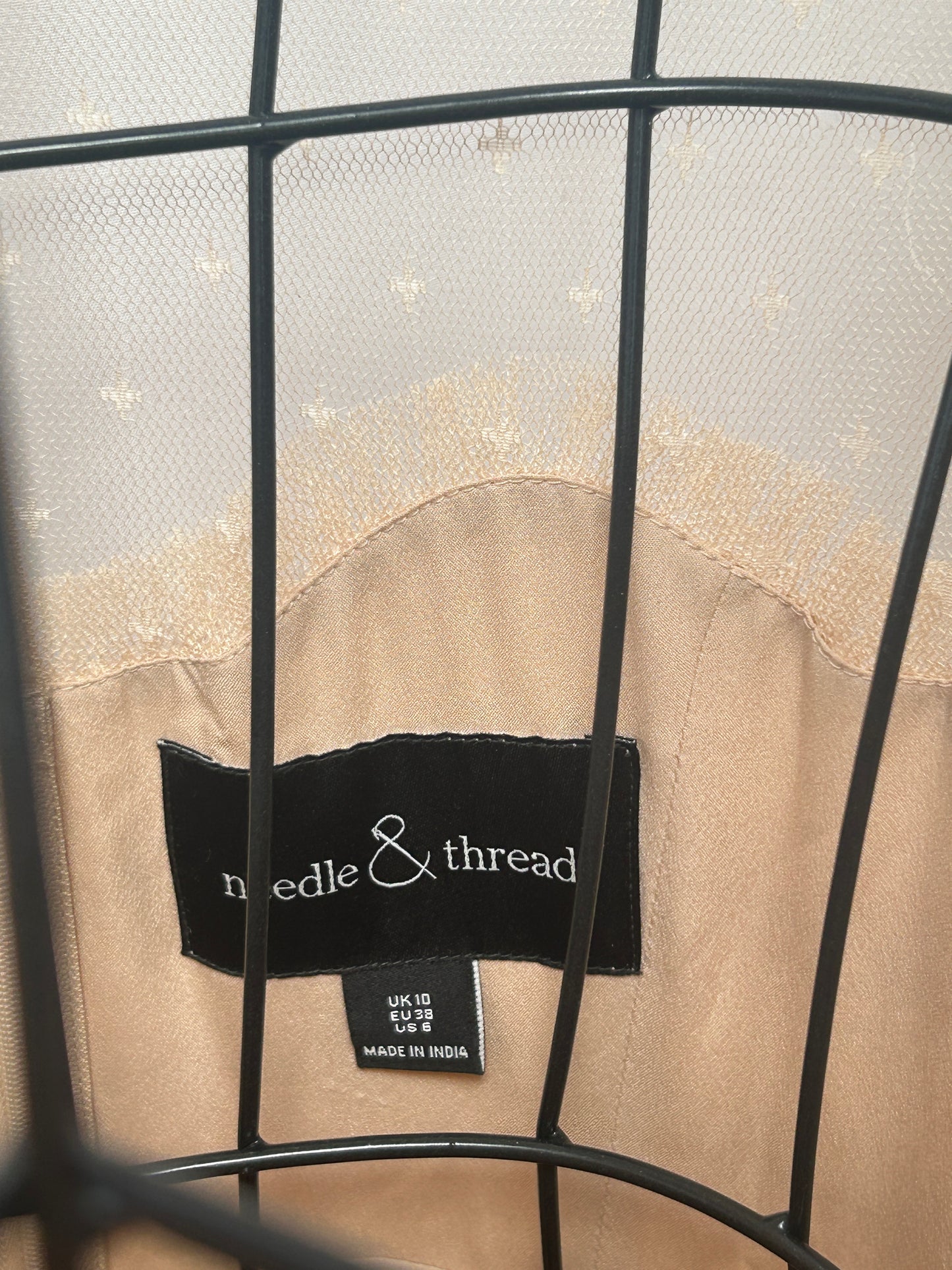 Needle & Thread
Beige dress