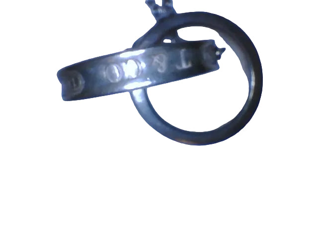 Tiffany & Co. 1837
Interlocking Circles Pendant in sterling silver, highlighted by its signature engraved hallmark and interlocking ring design.