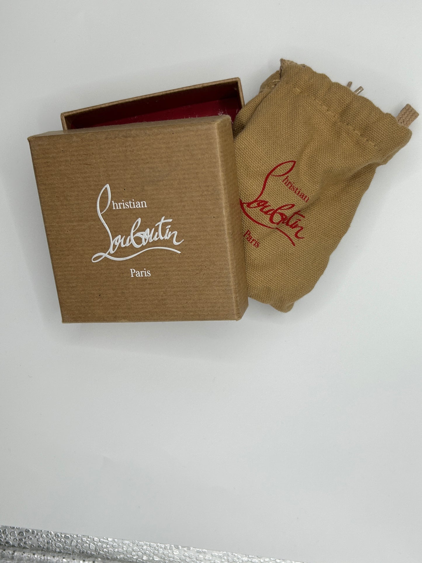 CHRISTIAN LOUBOUTIN
Elisa double patent-leather bracelet