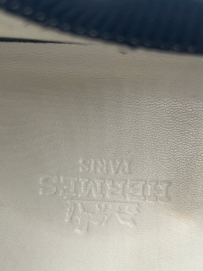 Hermès Addict knit fabric and suede sneakers in black and white