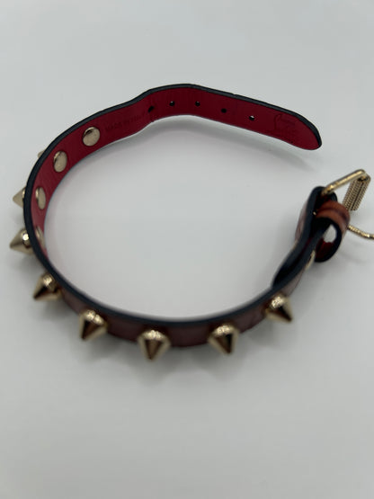 CHRISTIAN LOUBOUTIN
Loubilink spike-embellished leather bracelet