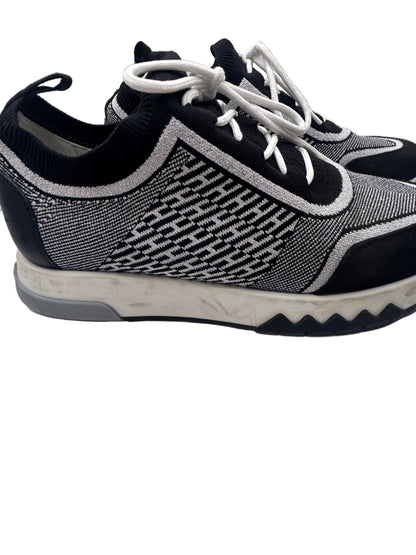 Hermès Addict knit fabric and suede sneakers in black and white