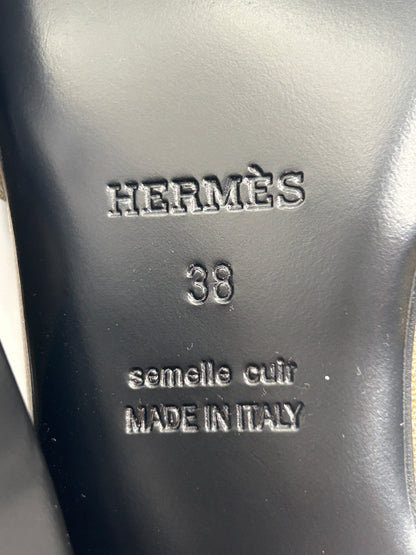 Hermès Oz mules in leather with a
Kelly buckle