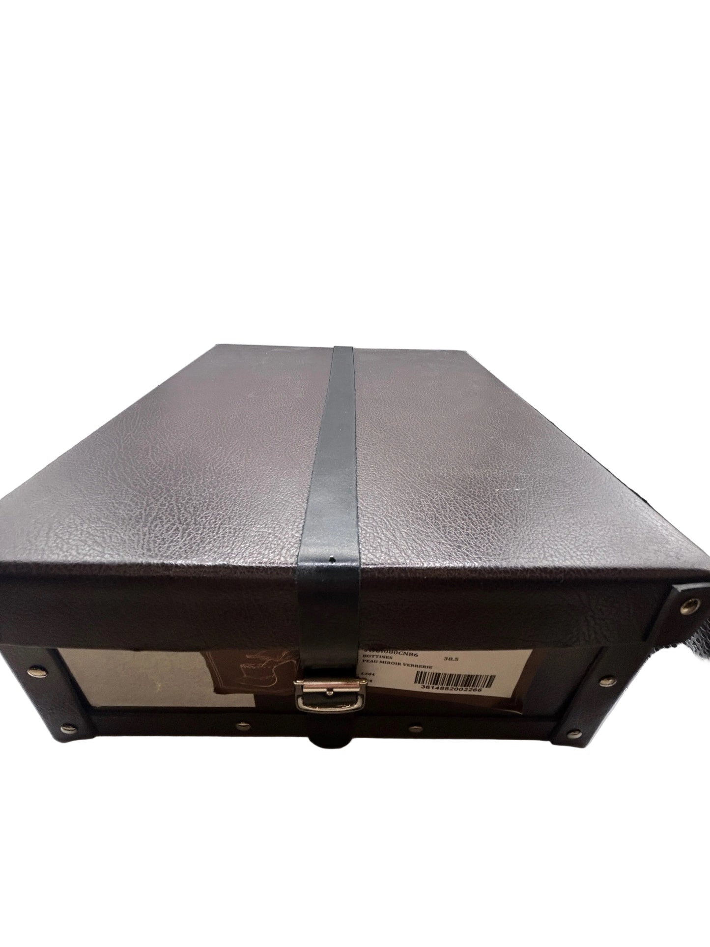 ALAIA Laser-Cut Studded
Pumps, Silver