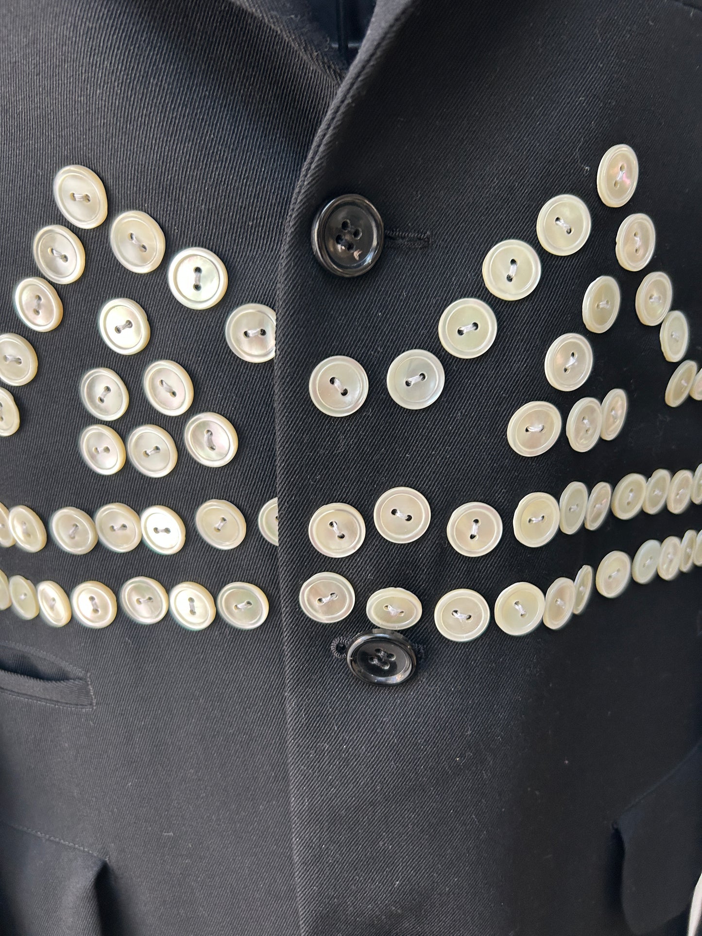 Comme des Garçons Homme
Plus for Men buttoned blazer
Black- Medium