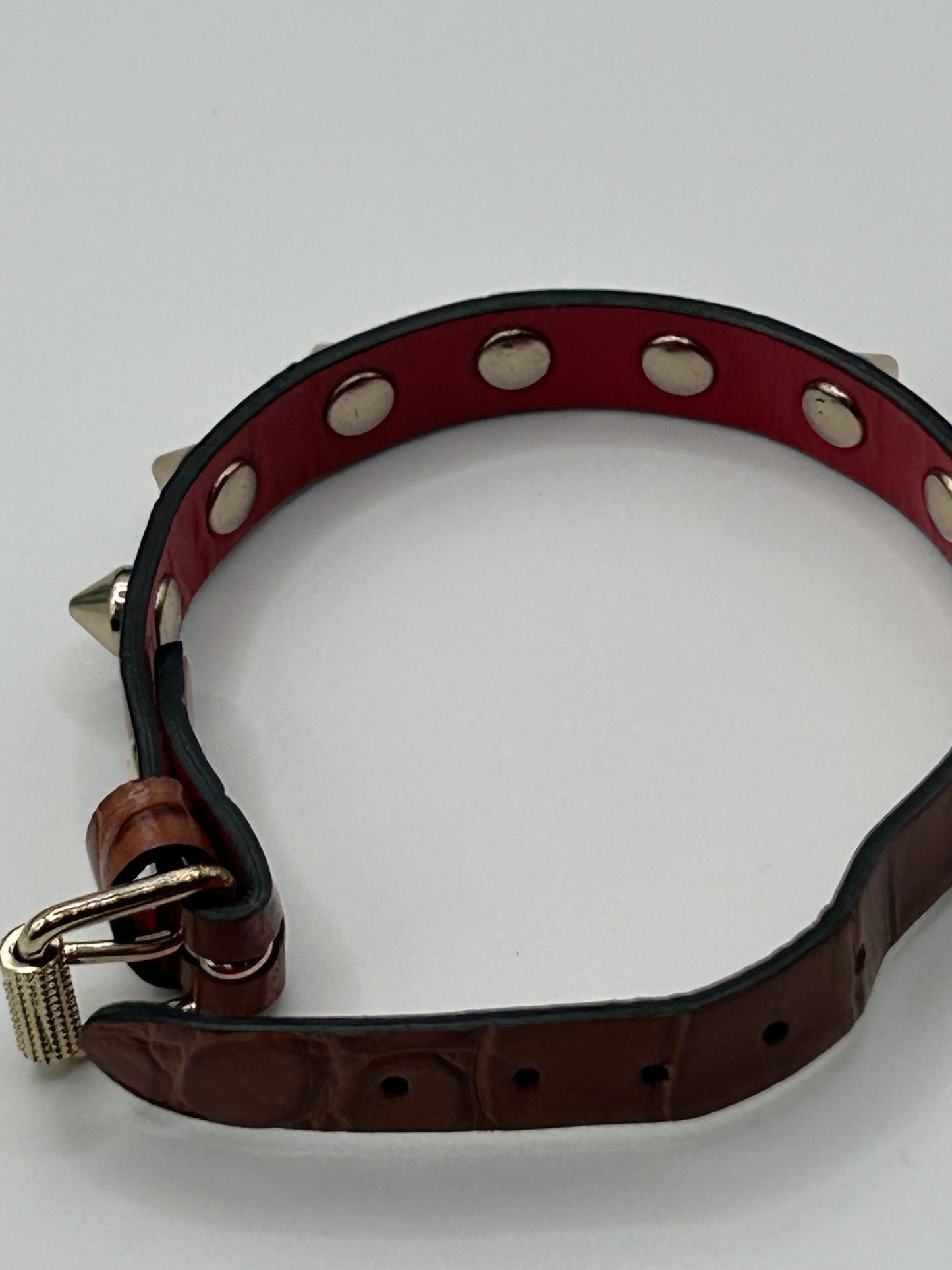 CHRISTIAN LOUBOUTIN
Loubilink spike-embellished leather bracelet