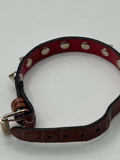 CHRISTIAN LOUBOUTIN
Loubilink spike-embellished leather bracelet