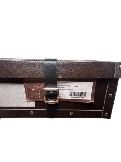 ALAIA Laser-Cut Studded
Pumps, Silver