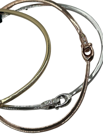 Coach Interlocking Signature C Stone Bangle Bracelet Set in tri-tone metal with crystal details