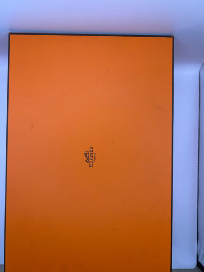 Hermès Oz mules in leather with a
Kelly buckle