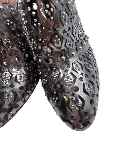 ALAIA Laser-Cut Studded
Pumps, Silver