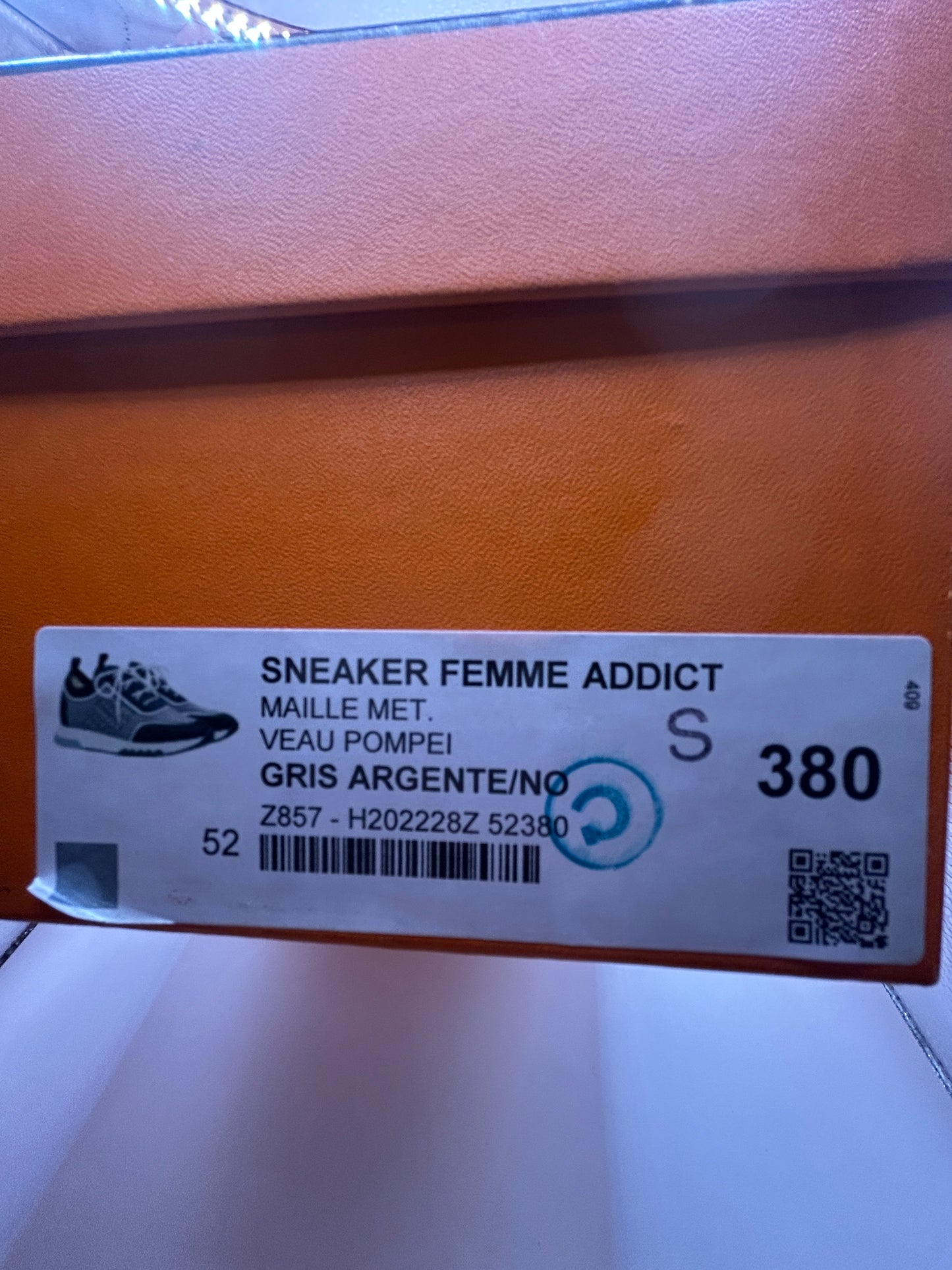 Hermès Addict knit fabric and suede sneakers in black and white