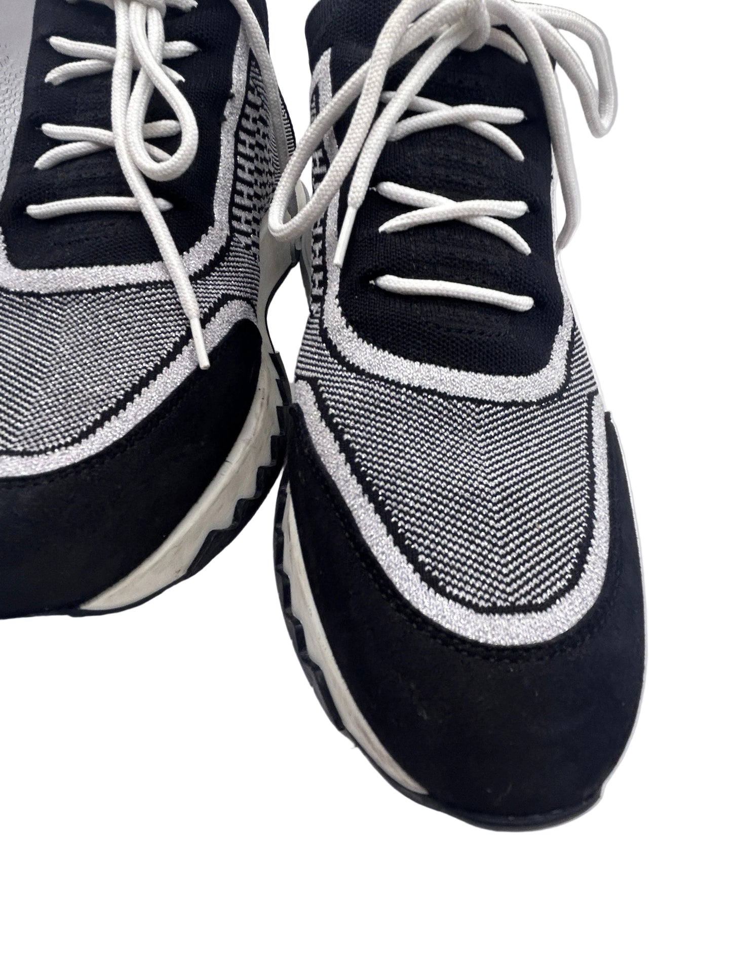 Hermès Addict knit fabric and suede sneakers in black and white