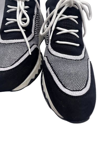 Hermès Addict knit fabric and suede sneakers in black and white