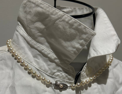 Vintage Mikimoto cultured Akoya pearl necklace with a silver clasp