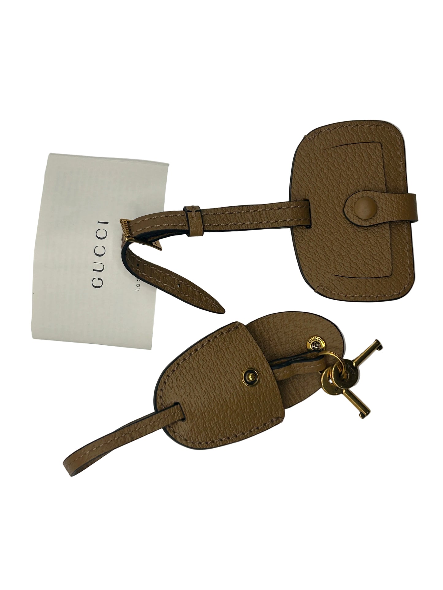 Gucci Bauletto mini top handle bag in black GG canvas and tan leather trim.
