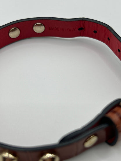CHRISTIAN LOUBOUTIN
Loubilink spike-embellished leather bracelet