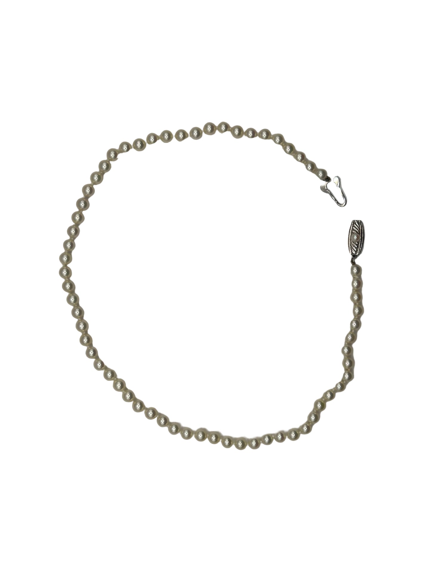 Vintage Mikimoto cultured Akoya pearl necklace with a silver clasp