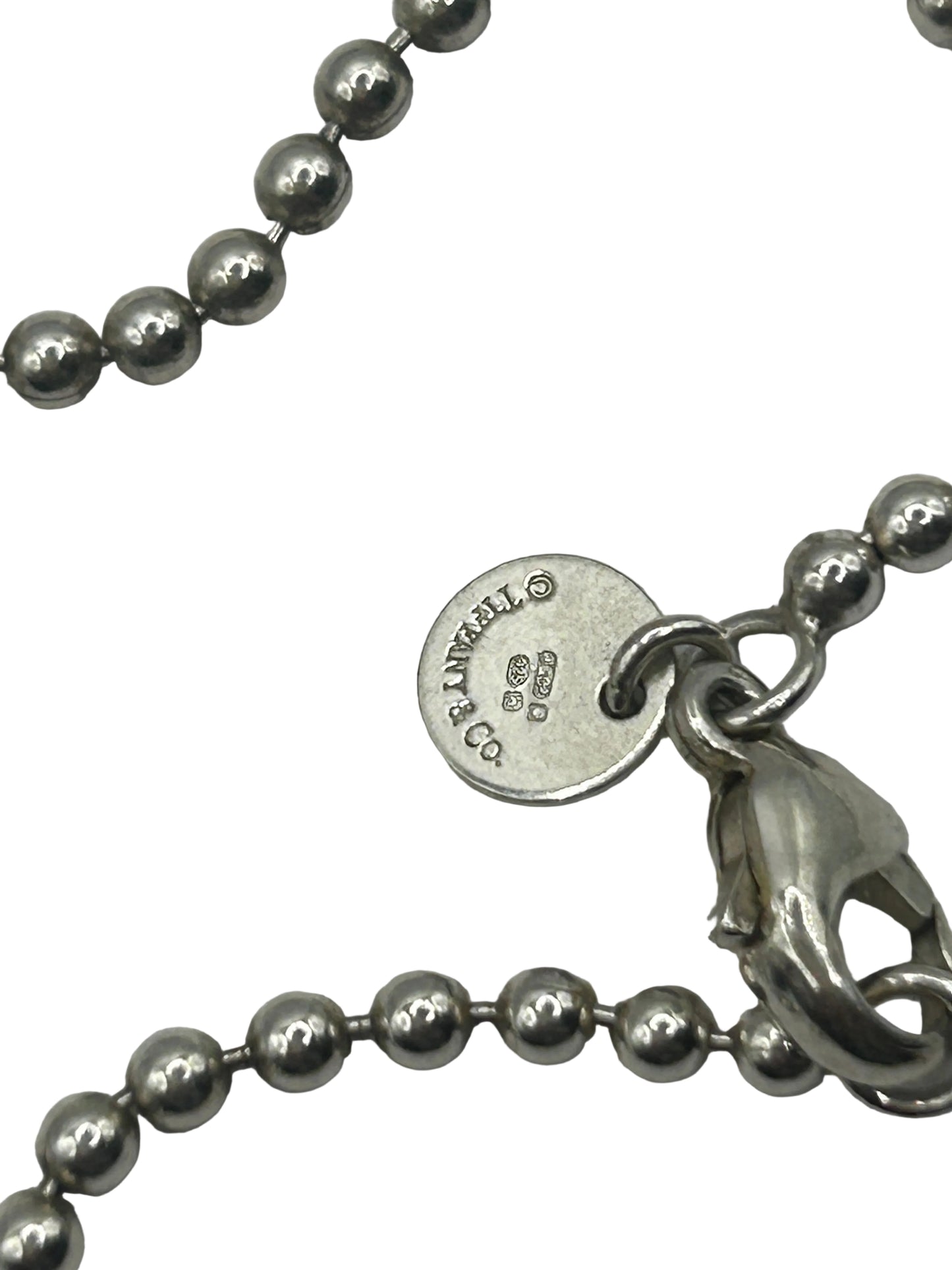 Tiffany & Co. Coin Edge Dog Tag
Necklace Silver