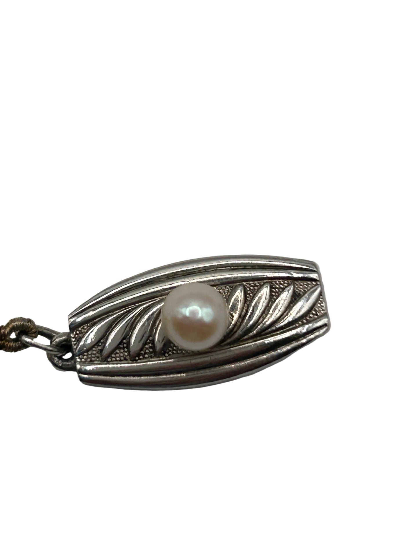 Vintage Mikimoto cultured Akoya pearl necklace with a silver clasp