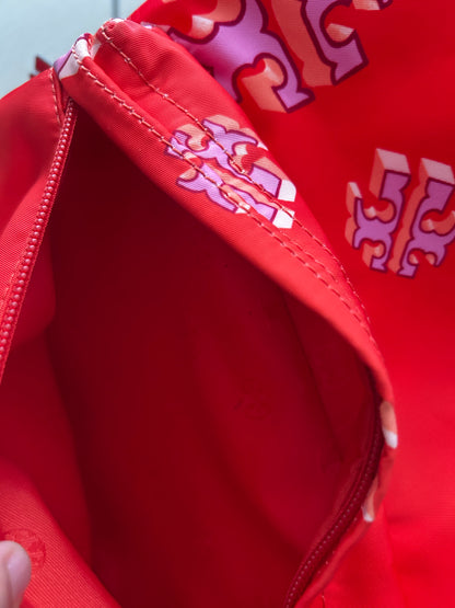 Tory Burch Ella Printed Backpack featuring a crazy logo allover pattern