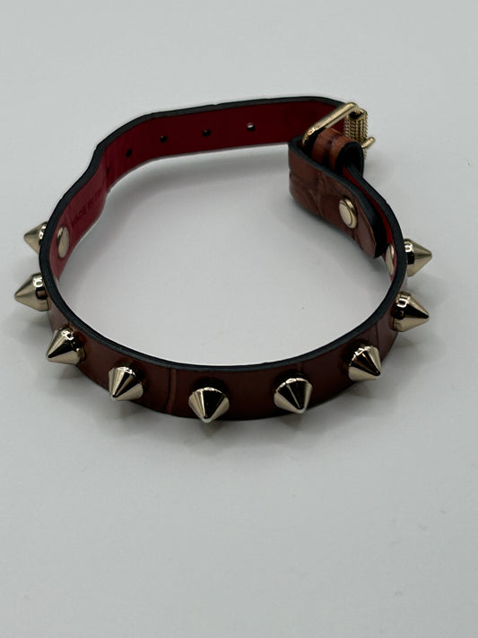CHRISTIAN LOUBOUTIN
Loubilink spike-embellished leather bracelet