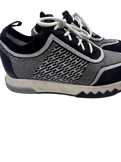 Hermès Addict knit fabric and suede sneakers in black and white