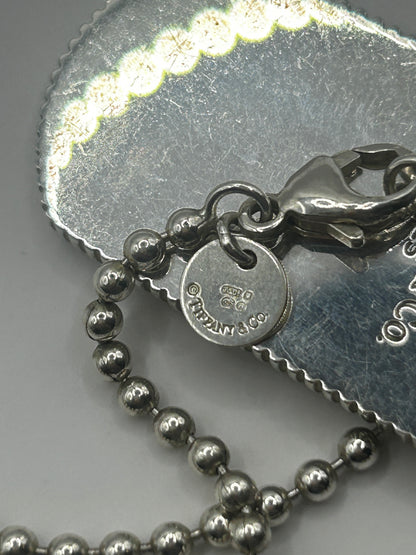 Tiffany & Co. Coin Edge Dog Tag
Necklace Silver
